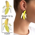 Detailed view of banana-shaped acrylic earrings with size and weight measurements - Banana