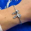 Elegante bracciale rigido in acciaio inox argento con fiocco 3D minimalista da donna - Color Acciaio