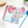 Dettaglio di un simpatico taccuino a spirale a forma di elefante con paillettes - Elefante