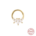 Detailed macro of gold-plated S925 sterling silver nose ring with marquise zircons - Gold Piece