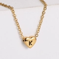 18K gold plated heart necklace with engraved letter K on white geometric stone - Letter K