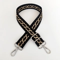 Detail of adjustable bag strap with golden chain pattern and silver metal swivel hooks - Black Strap Silver Buckle