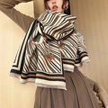 Elegant beige and brown pashmina scarf with floral patterns and soft tassel edges - Striped Camellia-Brown