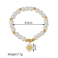 Detalle de pulsera de perlas con margarita, diámetro de 4,5 cm y peso de 7,7 gramos - JZB1094-si-Cuentas de Margarita de Perla