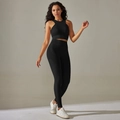 Detail of ribbed texture on black high-waist yoga set with side jacquard patterns - S / Top And Bottom / Tank + Long Pants / Black
