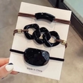 Set di tre elastici neri per capelli con forme geometriche in resina lucida - Set di 3 Pezzi Nero