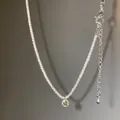 Silver-toned butterfly necklace with a round green gemstone pendant on a fine chain - X962 Silver Copper Chain