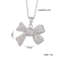 Collana con ciondolo a fiocco argento in rame con zirconi e dettagli sulle dimensioni - Fiocco in Zirconia Micro-intarsiata (Oro 1149) / Argento