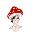 Creative enamel pin featuring a red mushroom cap with a slender golden female figure - Red and White Spotted Mushroom Girl