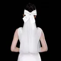 Macro shot of double-layered white bridal veil with large satin bow and soft mesh texture - 2-Layer Plain Large Bow 50CM