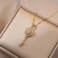 Elegant rotating flower key pendant necklace in gold finish with sparkling crystals - X0411 Gold Small Rotating