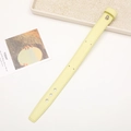 Detail of yellow leather phone wrist strap with metal buckle and adjustable holes on desk - Without Rivets / Light Yellow