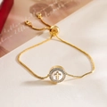 Detail of adjustable gold box chain bracelet with shell cross pendant and sparkling crystals - Cross Style (32017)