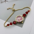 Detail of a women quartz watch with heart gemstone bracelet and pink marble dial - Gold Red