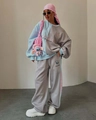 Detail of blue and grey patchwork sweatshirt set with pink side stripes and embroidery - S / Gray
