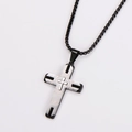 Detail of silver and black dual-layer cross pendant with Greek key pattern on box chain - Medium / With Chain / Two-tone Black