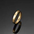 Detailed view of 8mm gold polished bevel edge stainless steel ring on black background - US 6 / 4mm / Gold