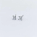 Close-up of S925 sterling silver four-leaf flower stud earrings with sparkling zircons - Silver With White Zirconia
