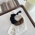 Black, brown and beige braided high elasticity hair tie on a minimalist rustic background - Brown Black