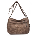 Vintage brown multi-pocket crossbody bag with soft leather texture and adjustable strap - Brown