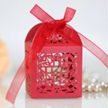 Red laser-cut gift box with hollow cross and vine patterns featuring a sheer organza ribbon - 50 Pieces / Pearlescent Red