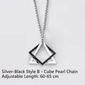 Detail of adjustable 60-65cm box chain with silver and black geometric diamond pendant - Style B (Interlocking Silver Black Triangle)