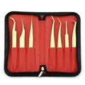Golden 7-piece eyelash extension tweezer set in a black leather case with red lining - Titanium Gold 7-Piece Tweezer Set with Black Case