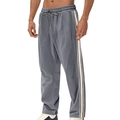 Detail of men's gray corduroy pants with elastic drawstring waist and side stripes - Gray