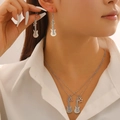Set gioielli chitarra argento con ciondoli luna stella e orecchini abbinati - Set Collana e Orecchini Chitarra Argento Antico