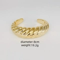 Brazalete grueso de oro retorcido con 8 cm de diámetro y un peso total de 19,2 g. - Estilo Espiral Retorcido (I)