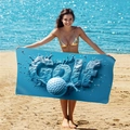 Blue double-sided velvet golf beach towel with 3D print held by a model on the beach - B69-Golf Sport