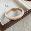 Detail of marble pattern acrylic resin bangle in vintage pink and cream finish - White Pink Marble Pattern