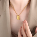 French style gold titanium steel necklace with rectangular pendant and letter V detail - Letter V Style (P1506-V)
