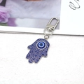 Hamsa Hand Schlüsselanhänger mit blauem Emaille, bösem Auge und glänzenden Strasssteinen - Silber Blaue Hand