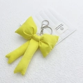 Cute bright yellow fabric bow keychain with silver lobster clasp for handbags - Yellow