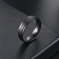 Macro detail of a 6mm matte black titanium steel ring with minimalist grooved edges - Size 5 / Black