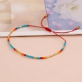 Pulsera bohemia de cuentas Miyuki de colores con cordón rojo ajustable artesanal - Cuentas Azules Múltiples/Cordón Rojo