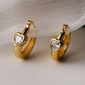 Elegant gold hoop earrings featuring sparkling heart-shaped cubic zirconia stones - Heart-cut Zircon Hoop