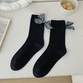 Black mid-calf cotton socks featuring a blue and white checkered bow tie accent - One Size / Black