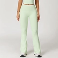 Muntgroene flare yoga broek met hoge taille en witte contrast bies details - S / Muntgroen
