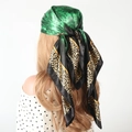 Green floral and leopard print satin square headscarf 90x90cm on a female model - The Wizard of Oz Green