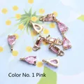 Detail of pink teardrop crystal pendants with gold frames for DIY jewelry crafts - 4*8mm / Pink