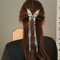 Detail of silver butterfly hair claw clip with long tassels worn on long brown hair - 58# Silver Butterfly Tassel Claw Classic