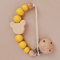 Yellow silicone and wooden bead pacifier clip with bear head shape on beige background - Yellow(55#)
