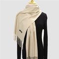 Classic beige cashmere scarf with elegant fringe details on a black sweater base - 200*70cm / Beige