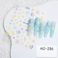 Close-up of MO-286 nail stickers featuring 3D floral and heart designs on blue nails - MO-286/Colorful Flowers & Hearts
