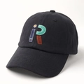 Detail of multi-color iR embroidery on black cotton baseball cap with twill texture - Adjustable / Black