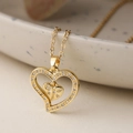 Collier doré avec pendentif double cœur serti de zircons brillants sur chaîne fine - 23747 Or Double Cœur Imbriqué