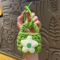 Handmade knitted mini coin purse in vibrant green featuring a cute star decoration - Pentagram Decor (Green)