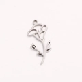 Silver stainless steel floral pendant with cutout flower and leaf pattern on white background - September Silver